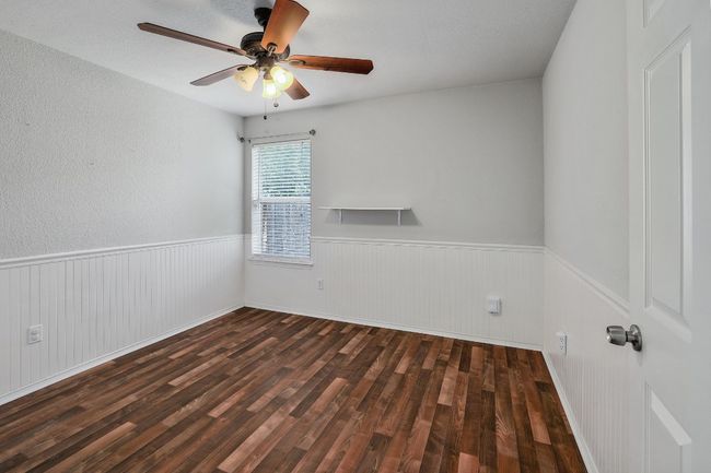 Empty room featuring wood finished floors, wainscoting, and a ceiling​​‌​​​​‌​​‌‌​‌‌​​​‌‌​​‌‌​‌​​​​​‌ fan | Image 21