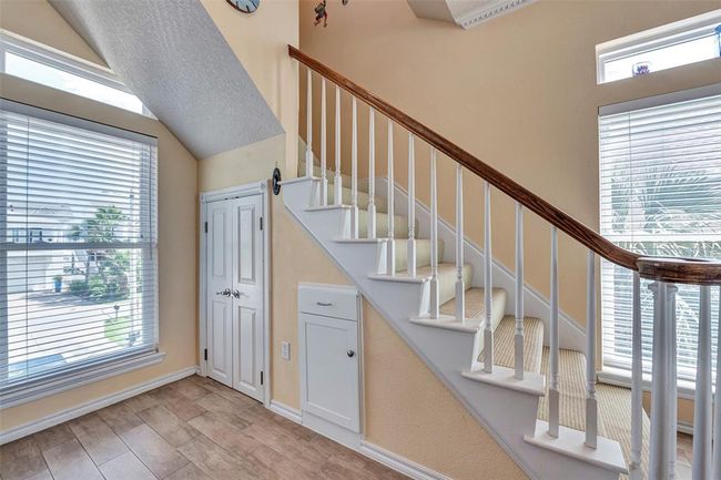 Tucked neatly beneath the staircase, the pantry offers clever use of space without sacrificing design. This area adds both charm and functionality to the heart of the home. | Image 14