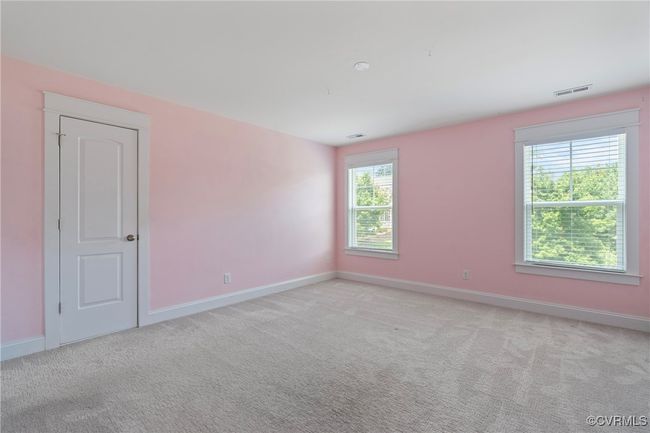 Carpeted spare room with baseboards | Image 31