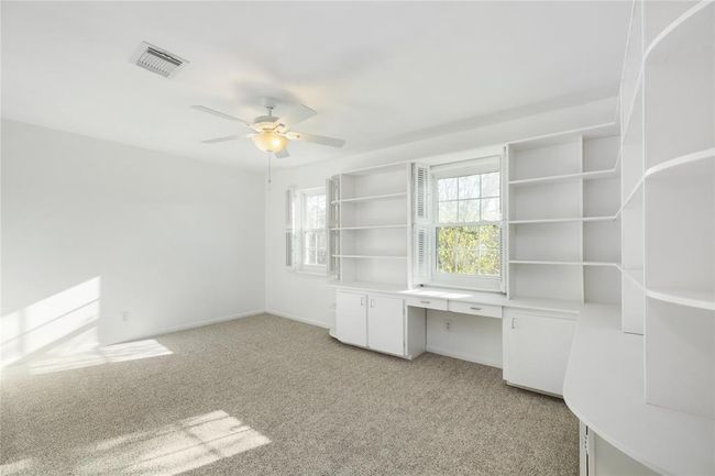2nd bedroom with shelfs, perfect for someone that loves to read, do homework, or office from home. These can be taken out. | Image 30