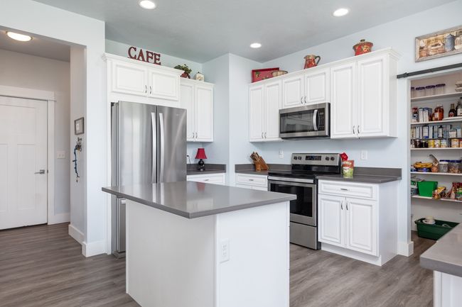 Door is entry to 3 car garage | Image 13