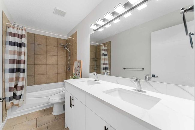 919 Shawnee Dr Sw, House other with 5 bedrooms, 4 bathrooms and 4 parking in Calgary AB | Image 29