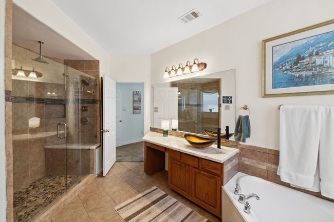 Large remodeled bathroom with oversized new shower with multiple sprayers | Image 8