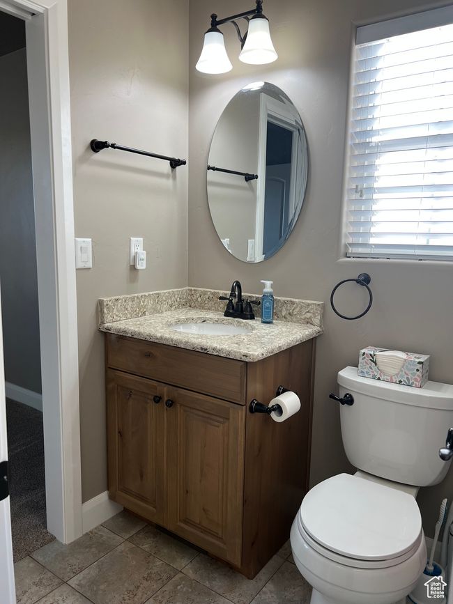 Bathroom with vanity and tile patterned flooring | Image 44