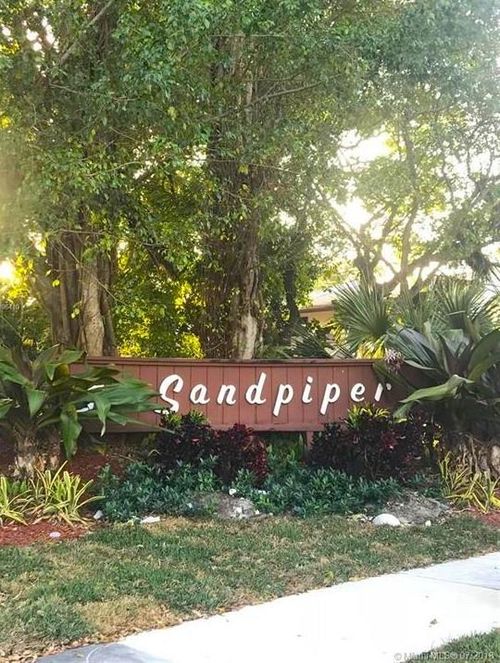 6y-598 Ne 199th Ter, Miami, FL, 33179-3002 | Card Image