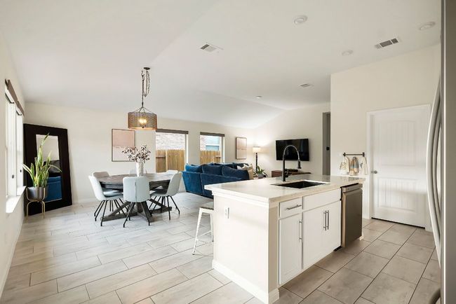 Sleek quartz countertops offer durability and modern elegance. | Image 10