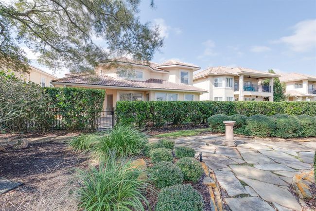 Rear of the home from walkway to the water. | Image 41