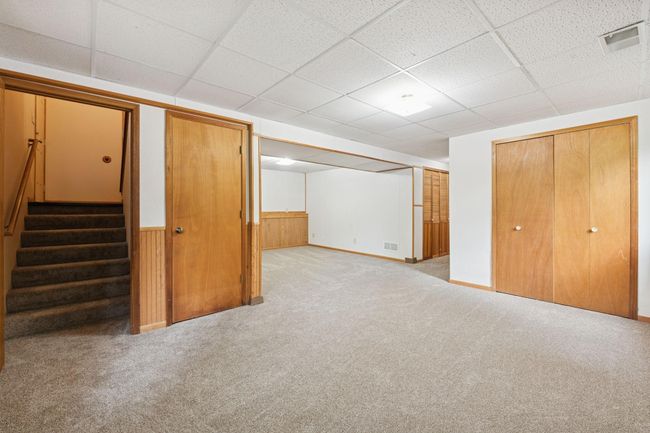 Downstairs, you'll find a large family room and flex space that can be used for a variety of purposes. | Image 19