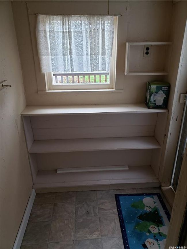 Rear porch has lots of nice storage. It is not included in square footage because it is unheated. | Image 13