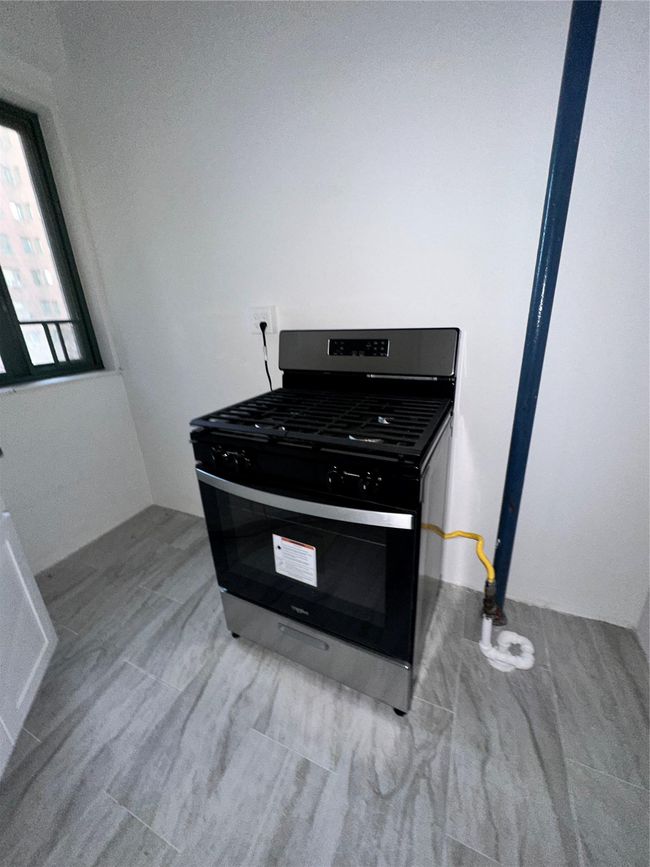 Interior details with stainless steel gas stove | Image 9