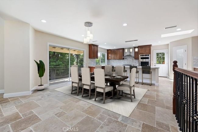 dining rm virtually staged | Image 12
