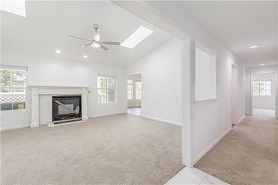 Carpet, Fireplace, Vaulted Ceilings, Skylight | Image 2