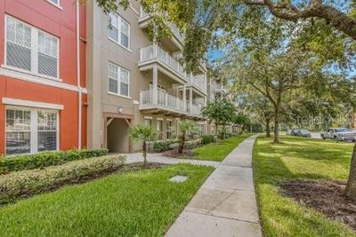 407 - 1410 Celebration Avenue, Condo with 2 bedrooms, 2 bathrooms and null parking in Celebration FL | Image 1