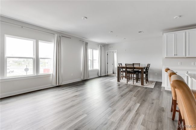 Dining space with light wood-type flooring and baseboards | Image 34