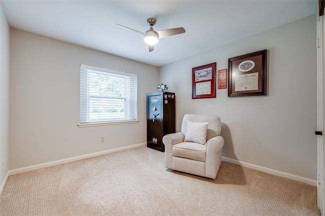 Bedroom 3 with with closet, carpet, ceiling fan, 2 inch blinds | Image 25