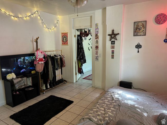 Interior space featuring light tile patterned floors | Image 8