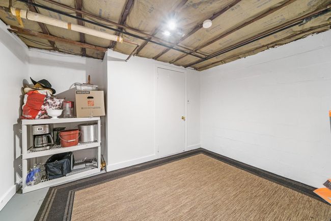 Finished basement with baseboards | Image 29