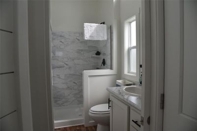 Bathroom with plenty of natural light and nice step-in shower | Image 2