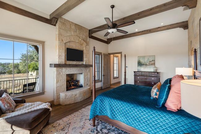 Owners' suite with gas fireplace | Image 23
