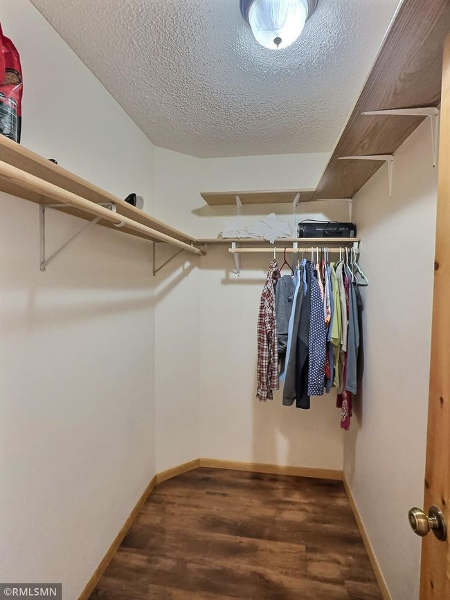It's time to go shopping, you'll certainly need more clothes to fill up the impresive primary walk-in closet! | Image 21