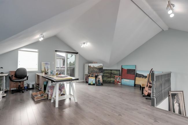 Office with wood finished floors | Image 20