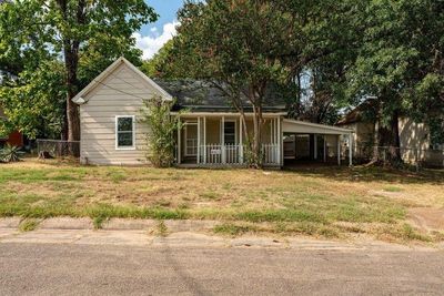 View of front of property with a carport and covered porch | Image 1