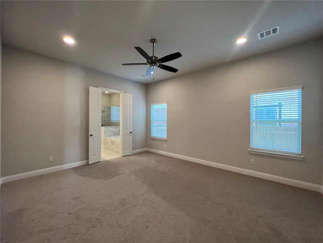 Spare room with recessed lighting, baseboards, carpet, and ceiling fan | Image 9