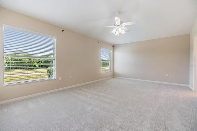 Master suite with new carpet and backyard views | Image 12