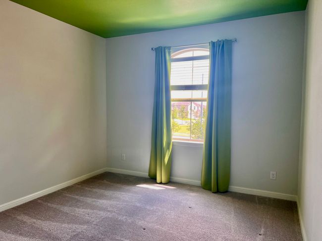Unfurnished room featuring carpet flooring and baseboards | Image 18