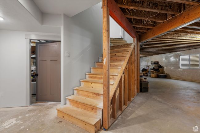 Stairs with unfinished concrete floors | Image 42