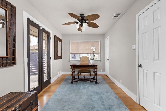 Office space featuring a wealth of natural light and french | Image 13
