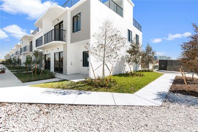 14514 Sw 260 St, Townhouse with 4 bedrooms, 3 bathrooms and null parking in Homestead FL | Image 1