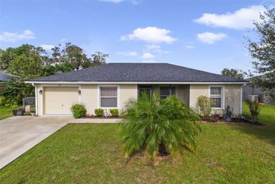 Welcome to Lake Eloise Pointe in the heart of Winter Haven and this 3BD/2BA home with a NEW ROOF (2023), desirable SPLIT BEDROOM floor plan, TILE FLOORS THROUGHOUT, a whole home WATER FILTRATION SYSTEM, large FENCED YARD and a LOW HOA! | Image 1