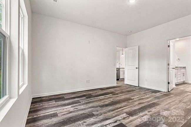 Primary bedroom view to bath area | Image 30
