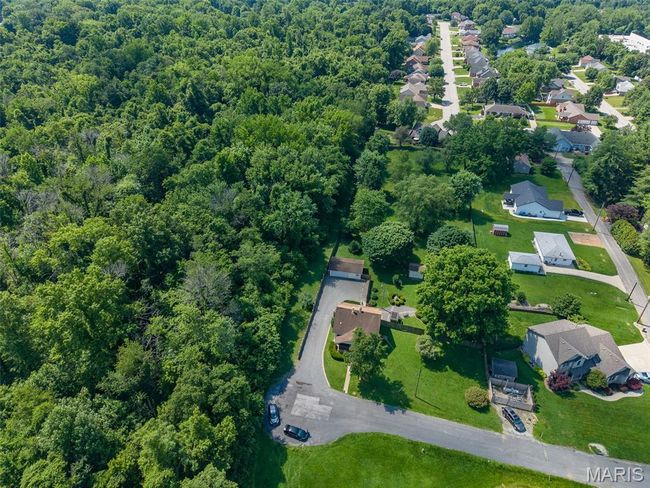 View of property location with nearby suburban area | Image 36