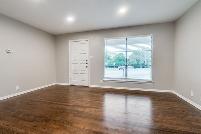 Living room featuring baseboards, dark real wood flooring, and recessed​​‌​​​​‌​​‌‌​‌‌​​​‌‌​​‌‌​‌​​​​​‌ lighting | Image 6