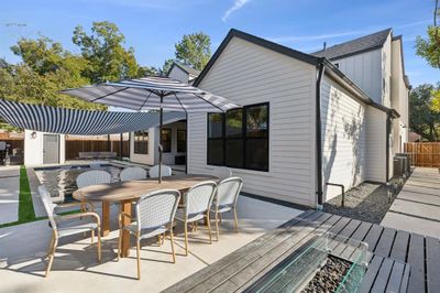 Backyard deck and outdoor dining area. | Image 2