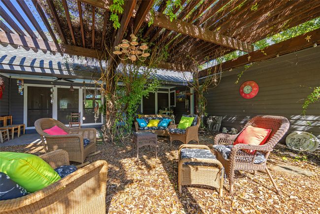 View of patio / terrace featuring a pergola, a ceiling fan, and an outdoor hangout area | Image 28