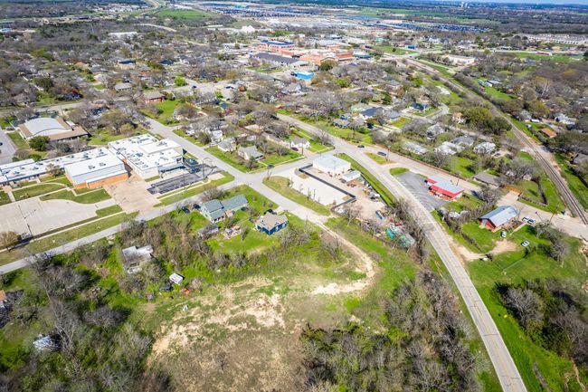 Aerial view of property's location with nearby suburban area | Image 7