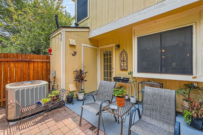Storage inside the closet. Great patio for relaxing! Backs to trees! Private/quiet. | Image 23