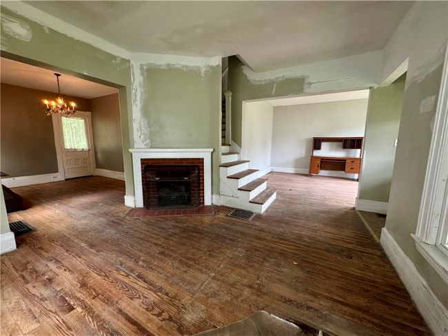Living room with fireplace | Image 5