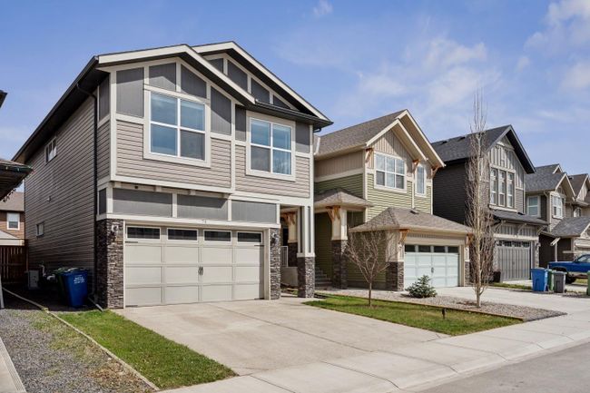 74 Buckskin Way, Home with 4 bedrooms, 3 bathrooms and 4 parking in Cochrane AB | Image 2