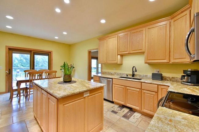 Kitchen with stainless appliances and center island | Image 11