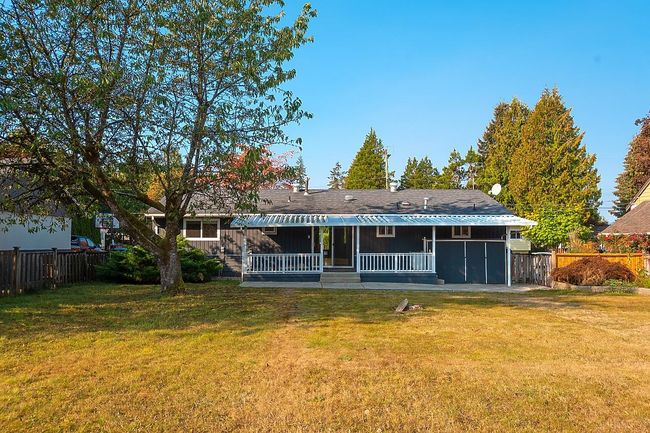 Back of property featuring board and batten siding | Image 28