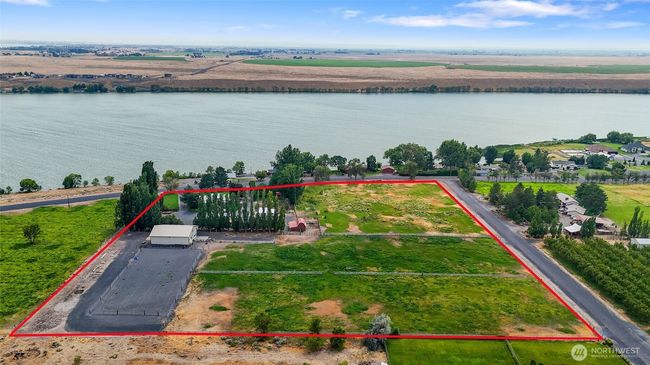 3 fully fenced separate pastures can be sold as a separate large corner lot. | Image 4