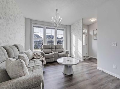 1281 Legacy Cir Se, Townhouse with 4 bedrooms, 3 bathrooms and 2 parking in Calgary AB | Image 2