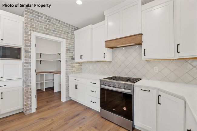 6706 Lauder Ln Ne, House other with 5 bedrooms, 3 bathrooms and null parking in Cedar Rapids IA | Image 10