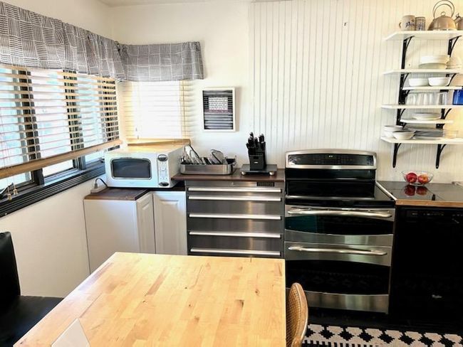 The hardwood flooring is painted black. It looks so nice. | Image 14