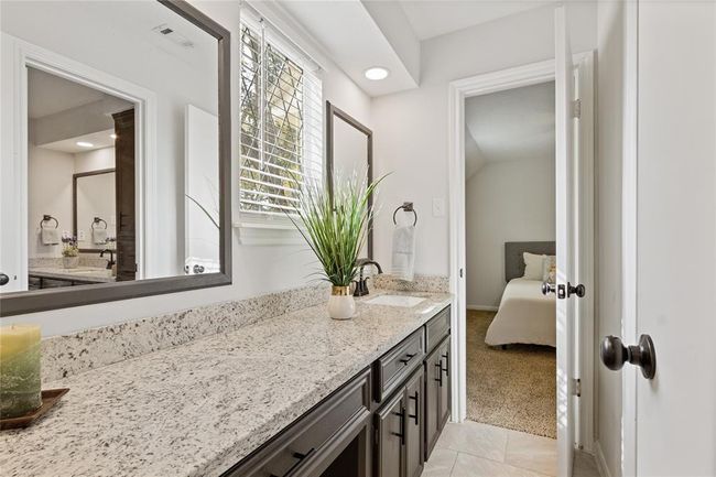 Shared bathroom. This view is the vanity and one sink shared with bathroom 2. | Image 38