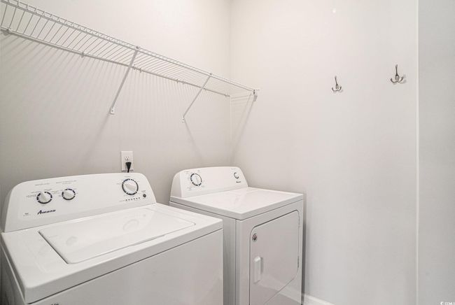 Laundry area with washing machine and dryer | Image 28